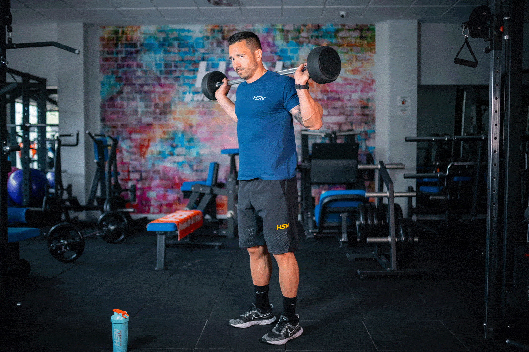 Calf in piedi con Bilancere